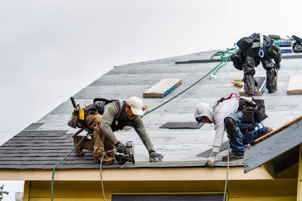 Professional Roofing technician working in Golden's Bridge, NY